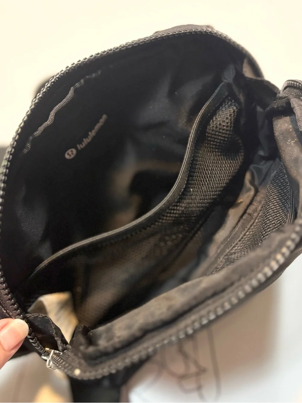 lululemon Everywhere Belt Bag 1L features a durable black nylon exterior